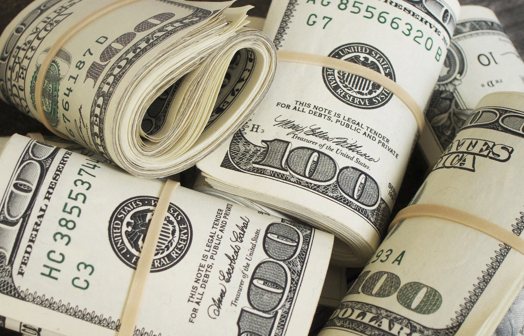"Money" by free pictures of money is licensed under CC BY 2.0.