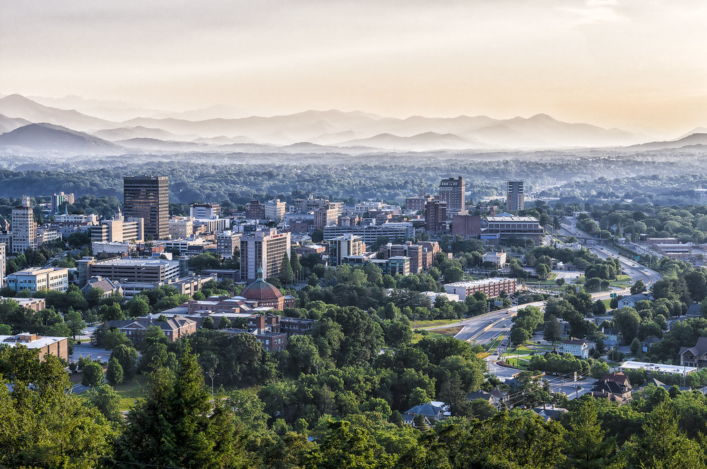 "City of Asheville, North Carolina" by @CarShowShooter is licensed under CC BY-NC-SA 2.0.